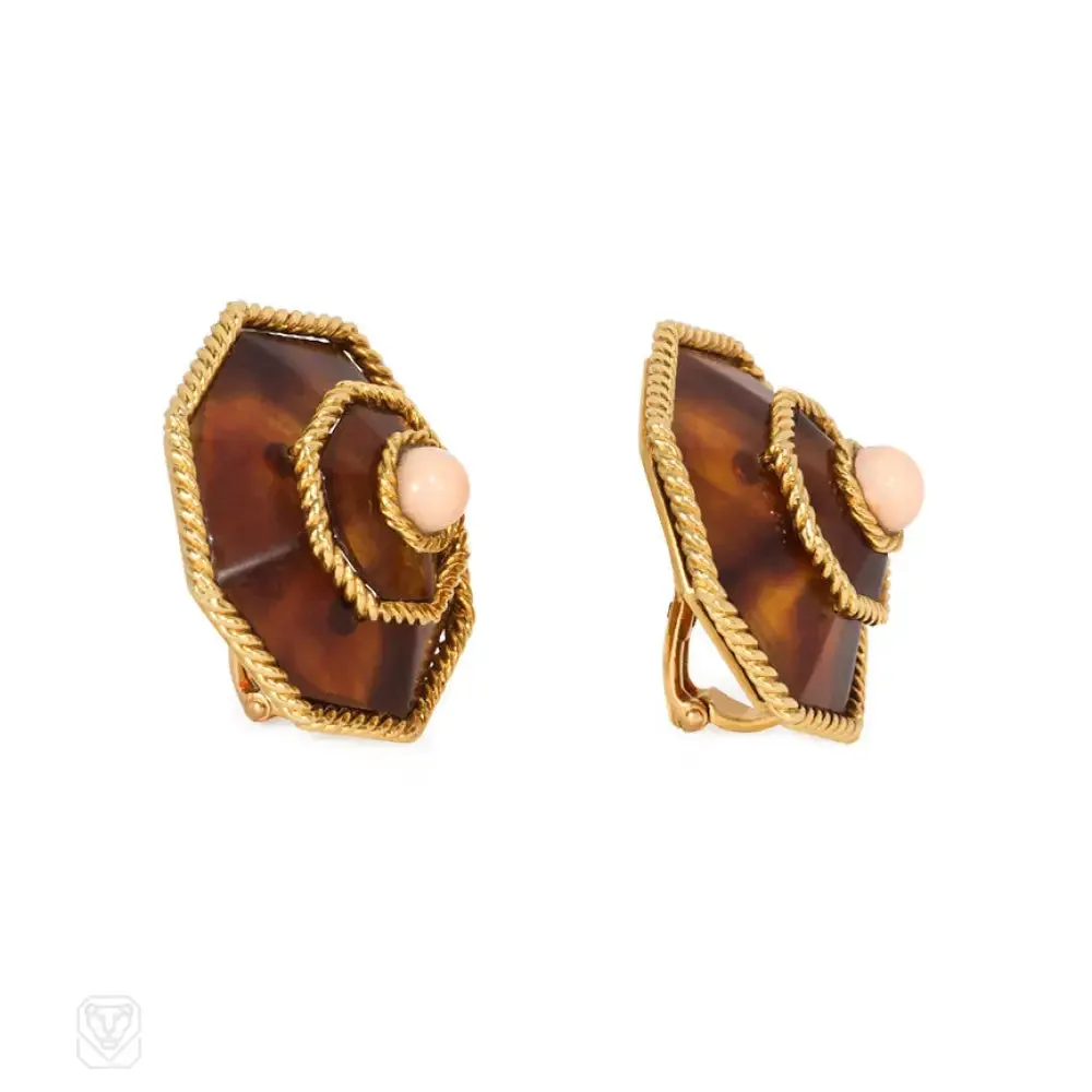 Gold, tortoise shell, and coral earrings, Boucheron.