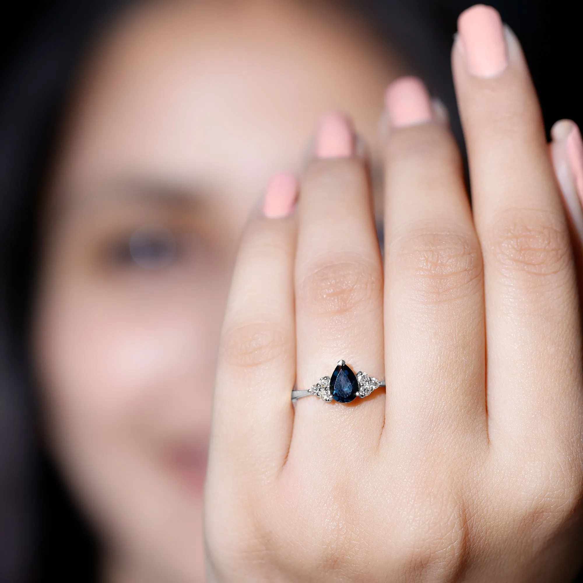 Pear Cut London Blue Topaz Engagement Ring with Diamond Trio