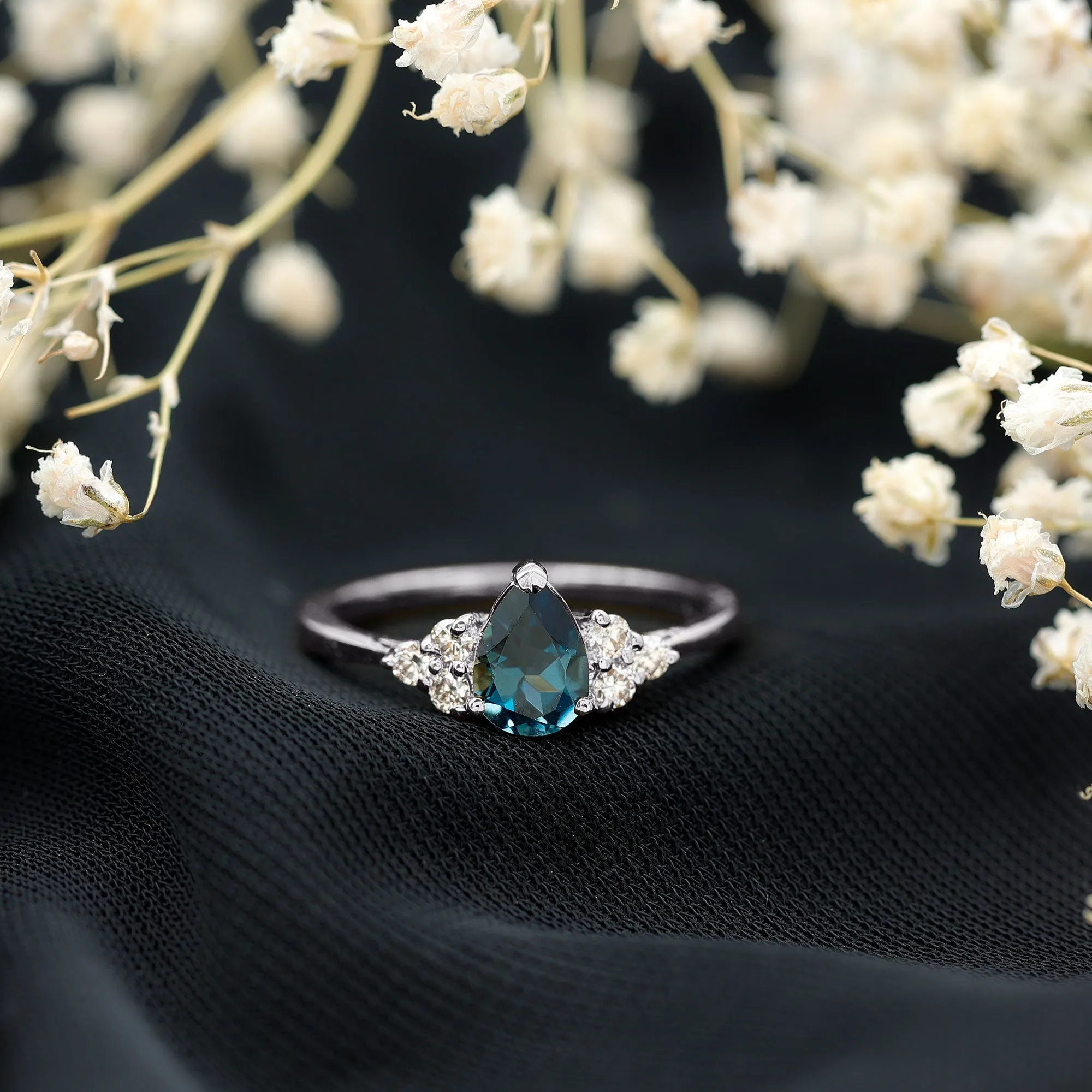 Pear Cut London Blue Topaz Engagement Ring with Diamond Trio