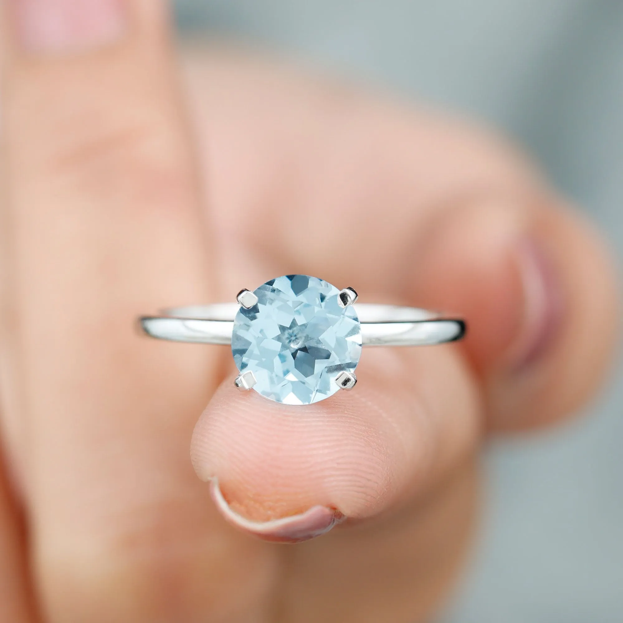 Simple Round Sky Blue Topaz Solitaire Ring