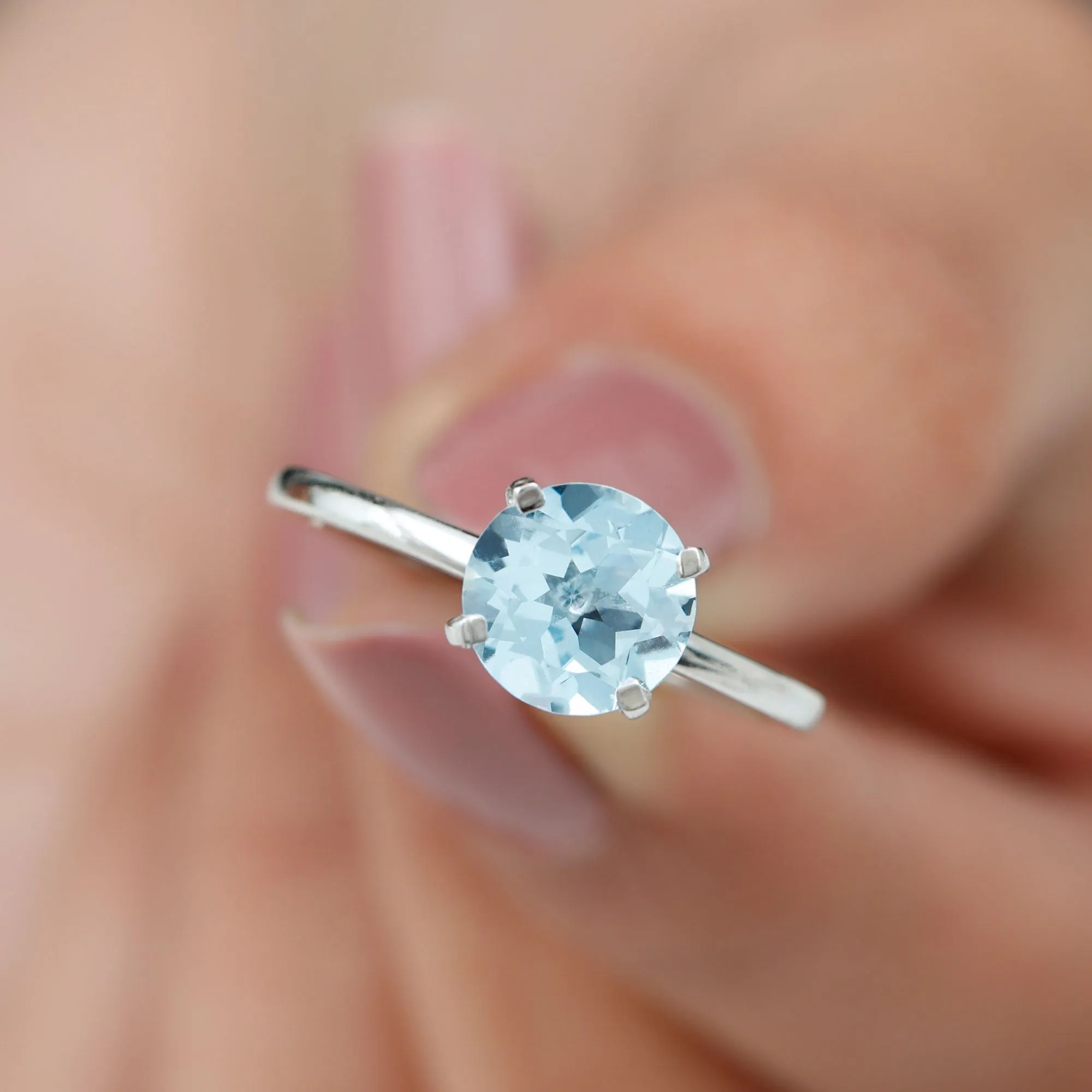 Simple Round Sky Blue Topaz Solitaire Ring