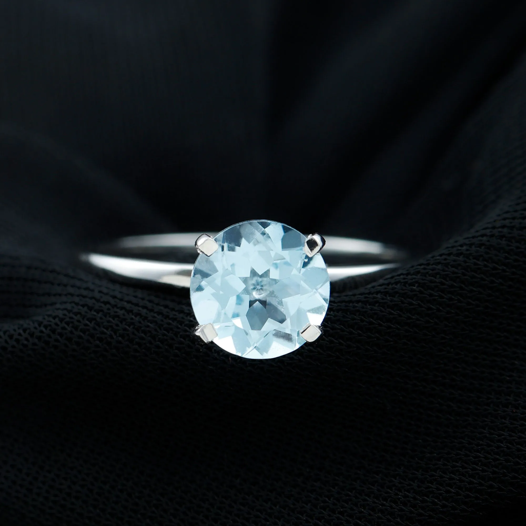 Simple Round Sky Blue Topaz Solitaire Ring